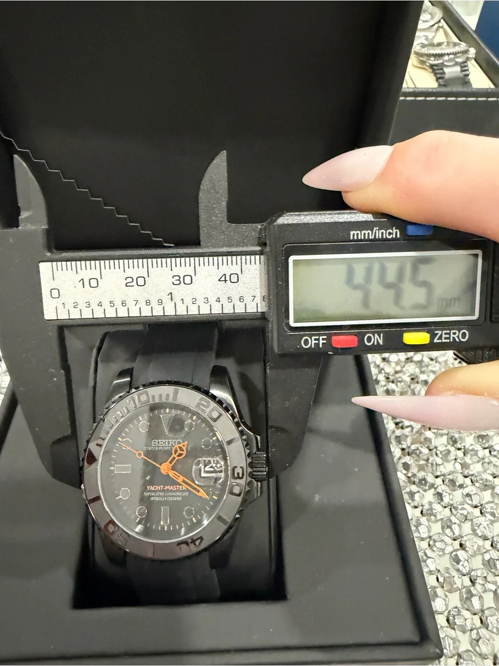 Seiko Men's Black Watch with Orange Hands and Markers